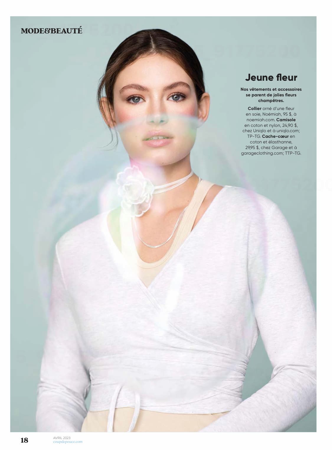 A woman wearing a light beige top and the Floral Choker by Noémiah, featuring layered silk organza, poses against a pastel blue background with a translucent circular overlay centrally placed on the image.