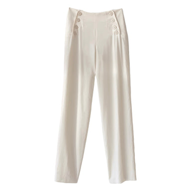 The Frédérique Trousers — Bridal Edit by Noémiah are high-waisted, white Merino wool twill trousers with wide legs and button accents on the front.