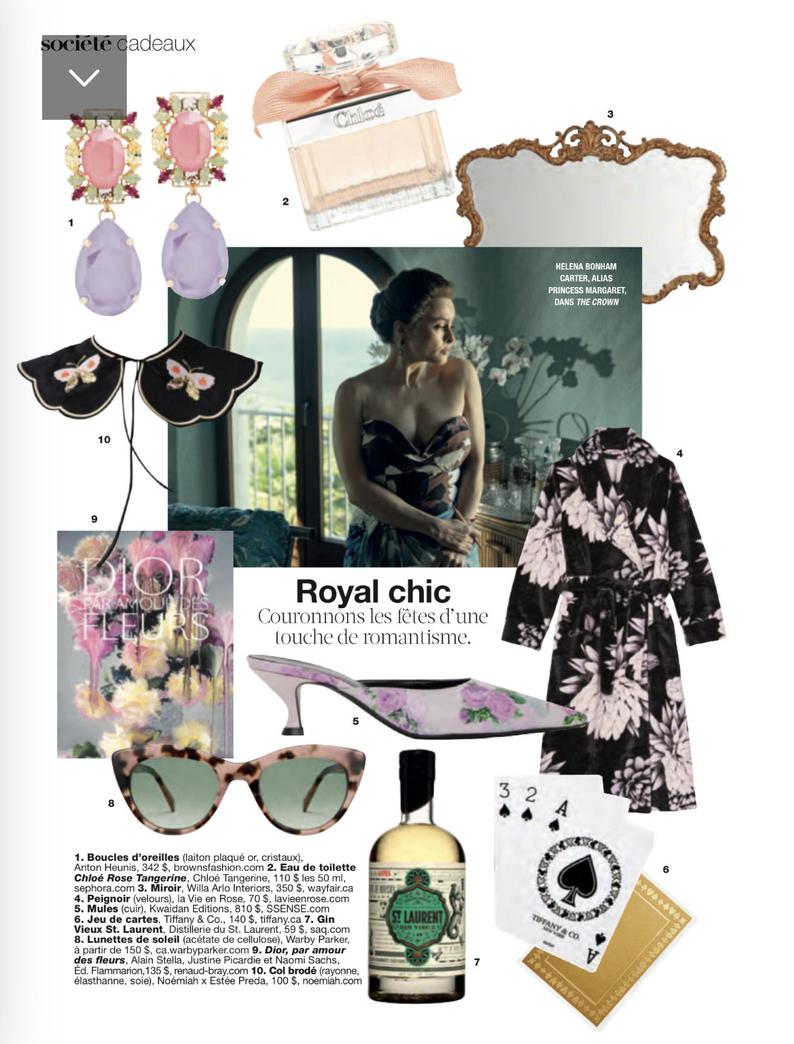 A collage featuring a woman in a floral dress with the Olivia Black Collar by Noémiah, accessorized with stylish earrings and sunglasses. The setting includes a bottle of gin, playing cards, a perfume bottle, and a book with a floral cover. Exuding Royal chic, it celebrates romantic style for memorable occasions.