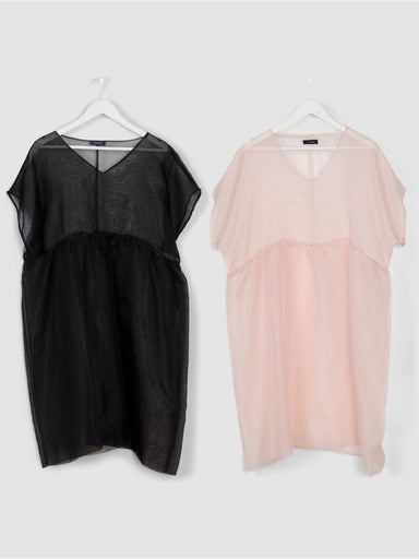 Two Tulip Dresses from noemiah, showcasing sheer, short sleeves, hang on white hangers against a light gray background. One dress features a classic black hue while the other is crafted in soft pink. Both are made of silk organza with a relaxed fit and elegant v-necklines complemented by gathered waist details for effortless style.